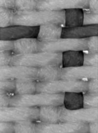 Poly/cotton ESD fabric magnification